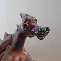 red clay dragon sculpture